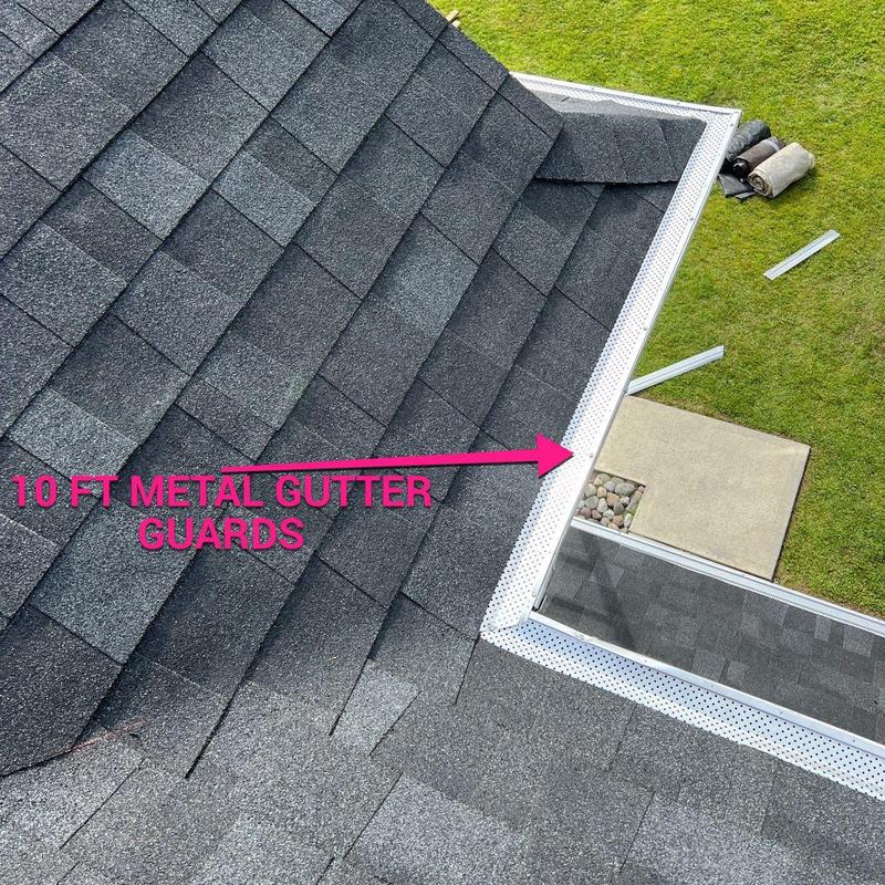 Metal gutter guards installation on roof edge Metal gutter guards installation on roof edge