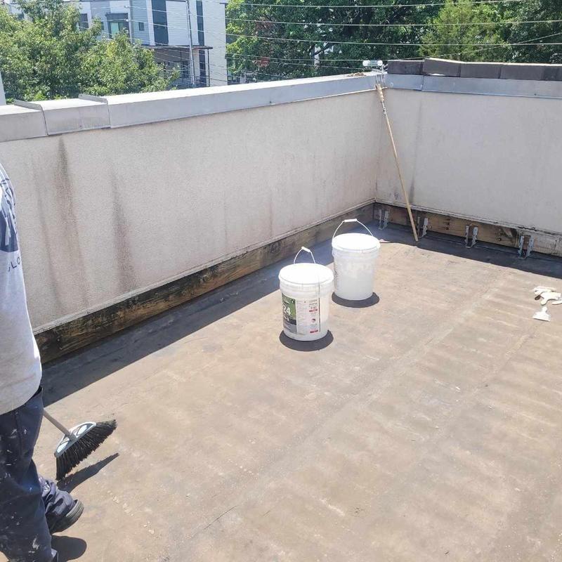 TPO flat roofing surface with prep materials