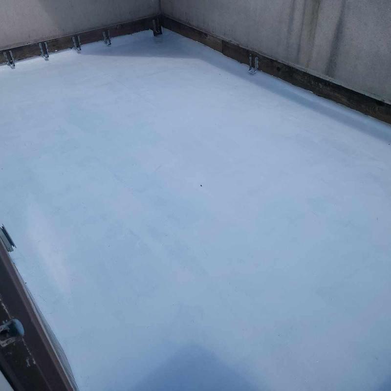 TPO flat roof membrane on apartment building