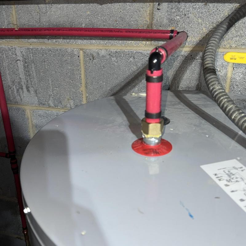 50 gallon water heater with red flex piping connections