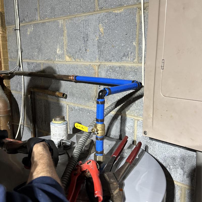 Water heater repiping with blue PEX and copper lines
