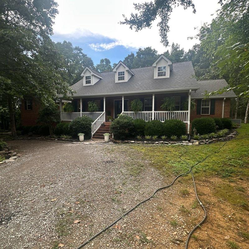 Asphalt shingle roof with hail damage inspection