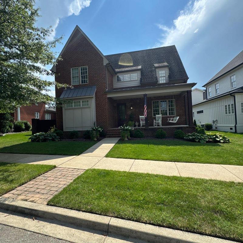 Asphalt shingle roof with hail damage inspection