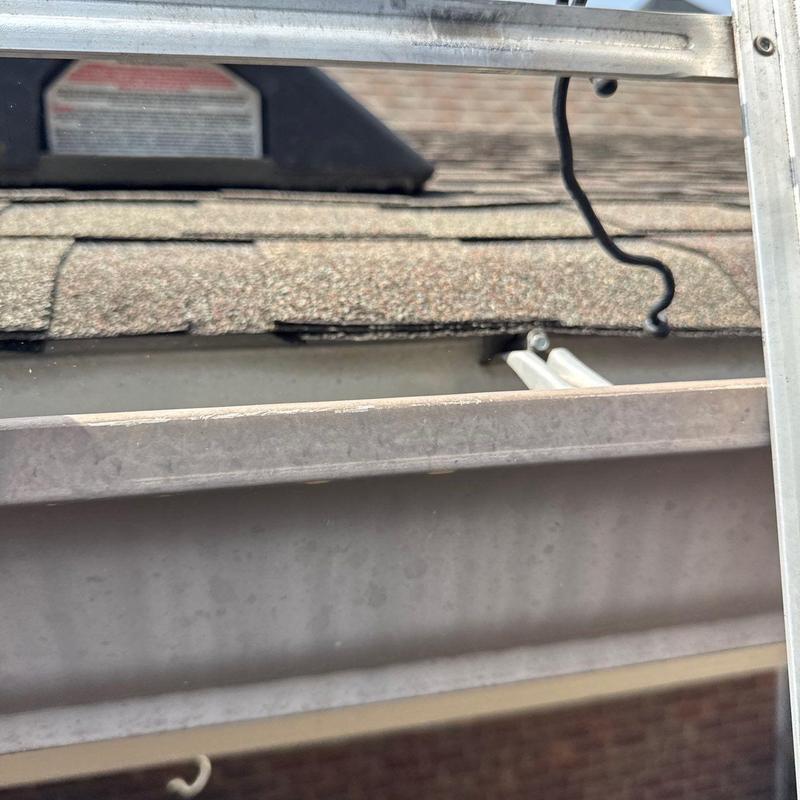 Shingles with hail damage and minor flashing issues