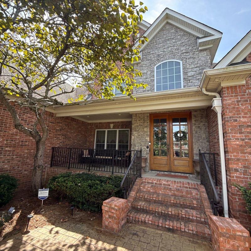 Roof shingles with hail damage inspection at home entrance