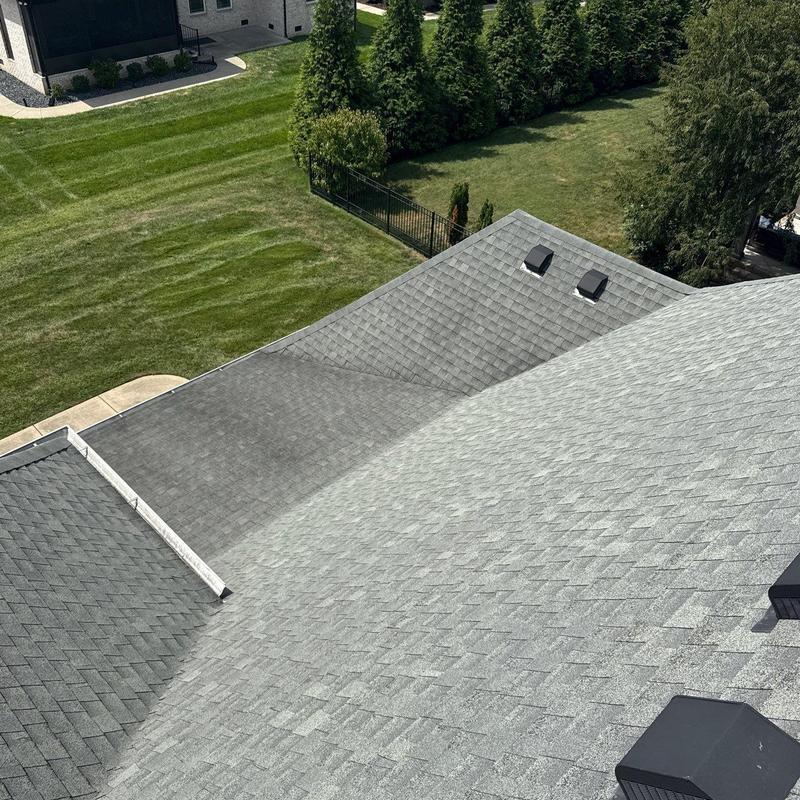 Asphalt shingle roof with hail damage inspection