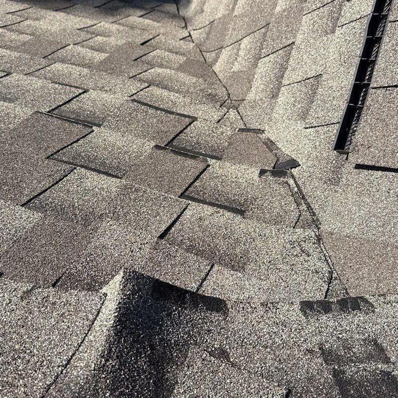 Asphalt roof shingles with hail damage in Franklin TN