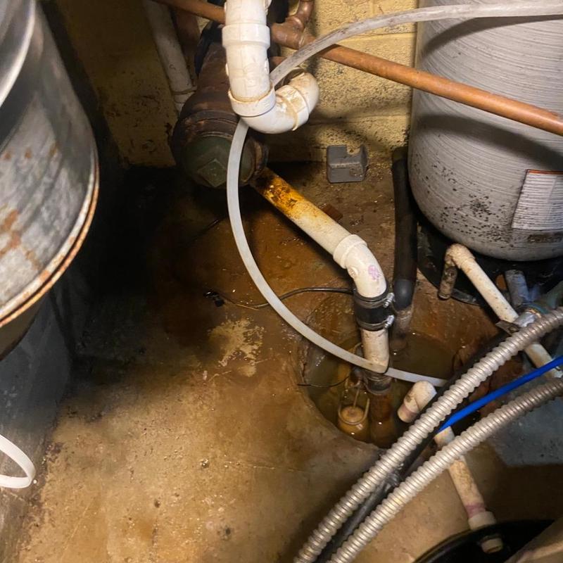 Sump pump replacement with connected plumbing pipes