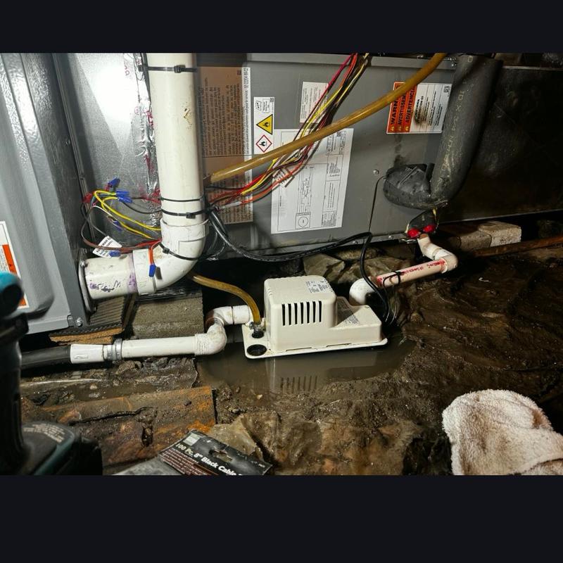 Condensate pump and PVC pipe installation by furnace