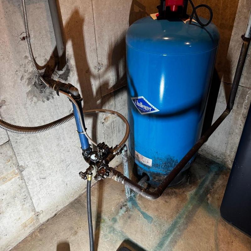 Well pressure tank and piping with gauge and switch