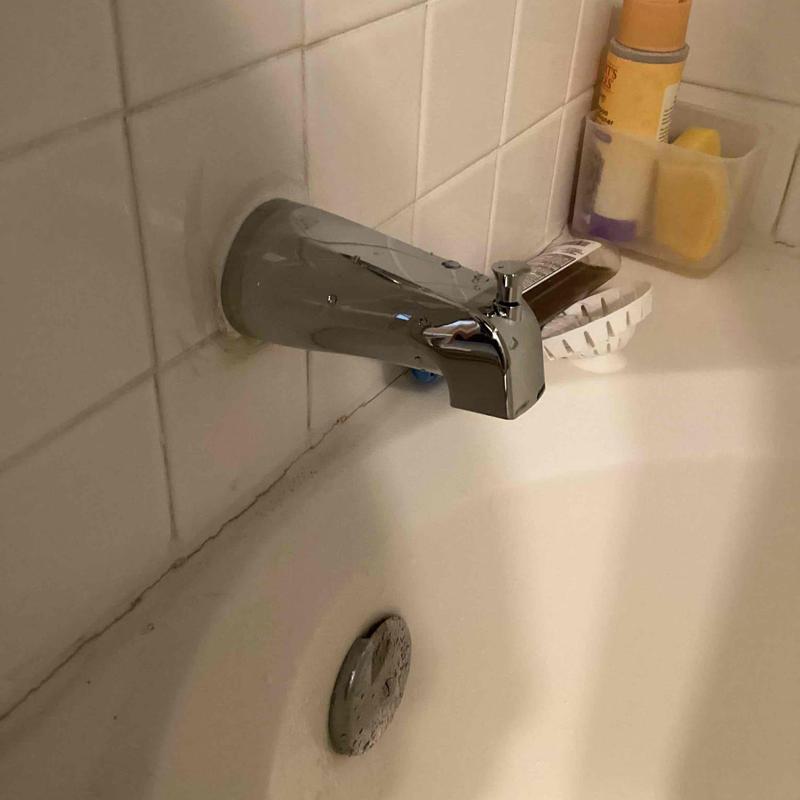 Tub spout replacement on tiled bathtub wall