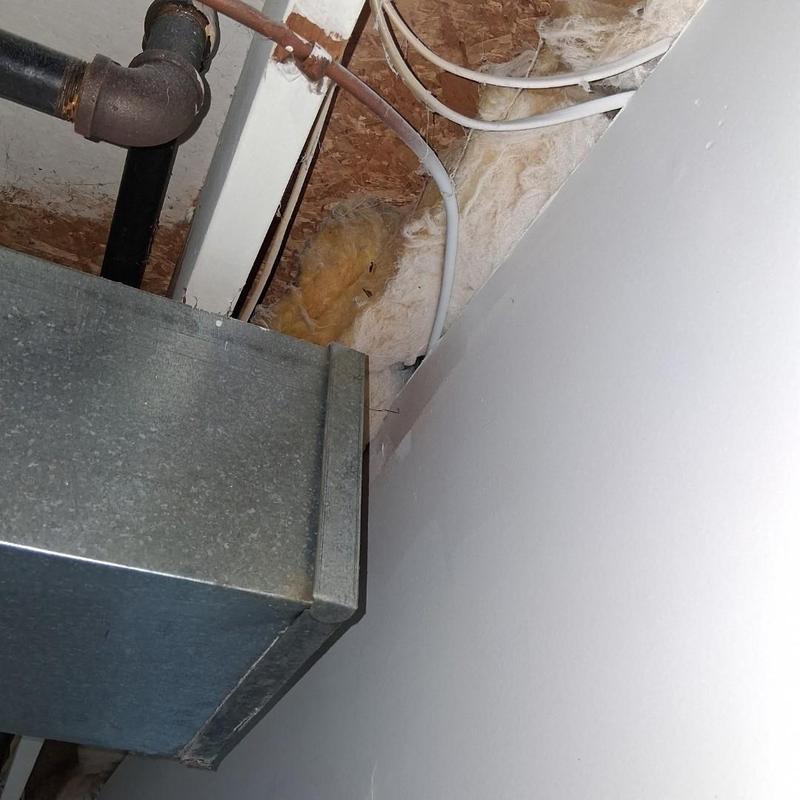 Gas line and water heater piping in attic space