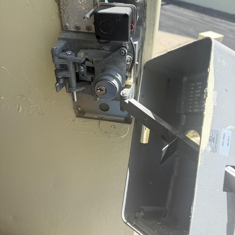 Commercial door lock and latch rekeyed with new keys