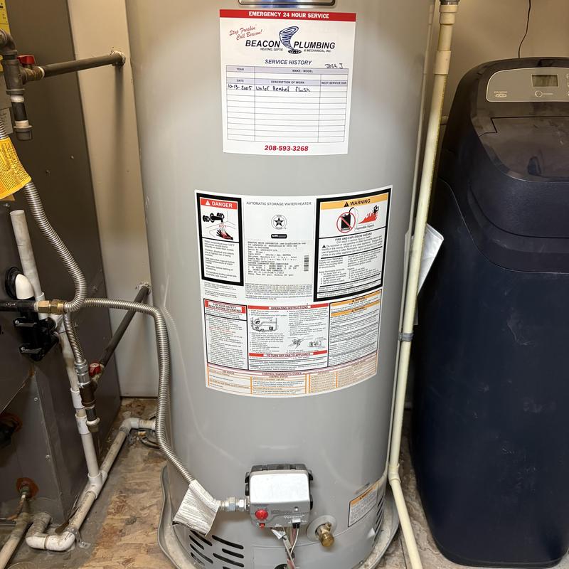 Water heater with service history and warning labels