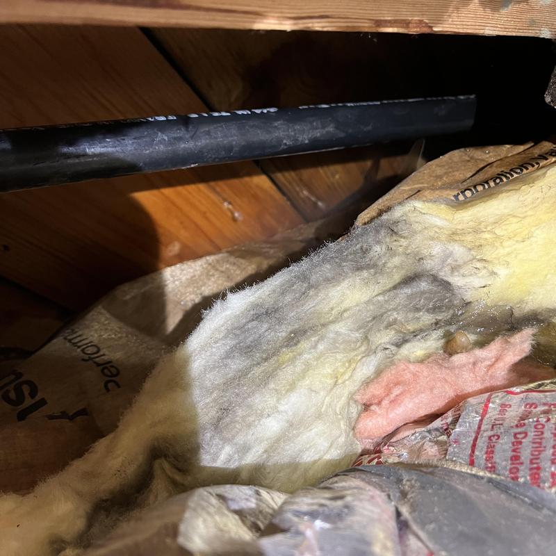 PEX water piping installation in attic insulation space