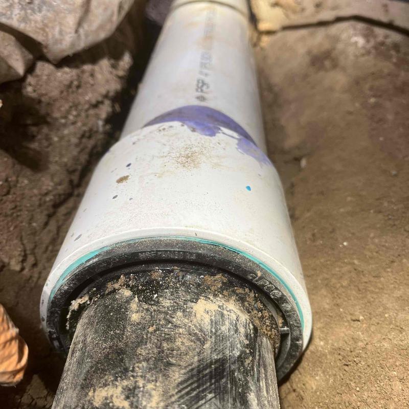 4 inch sewer main pipe connection in crawlspace