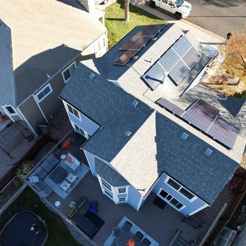 Asphalt shingle roof with solar panel installation