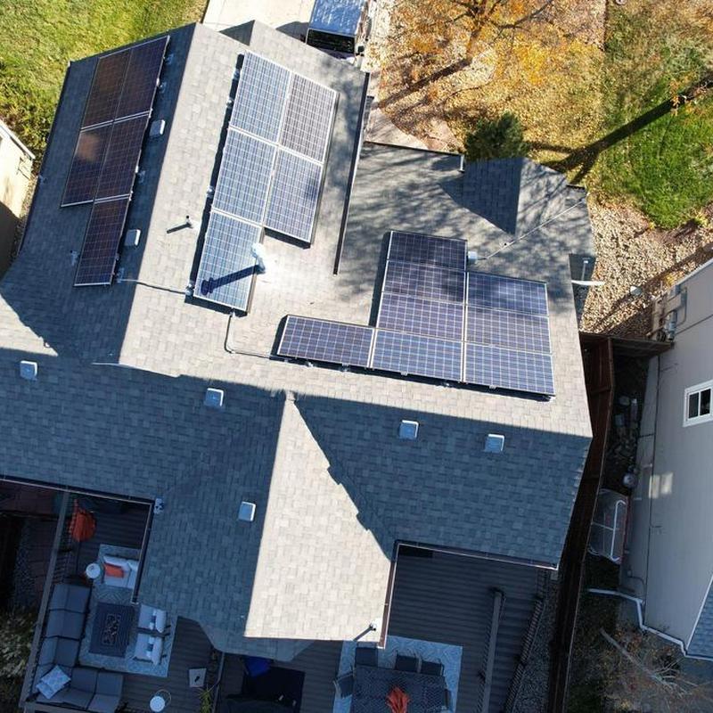 Solar panel array installation on asphalt shingle roof