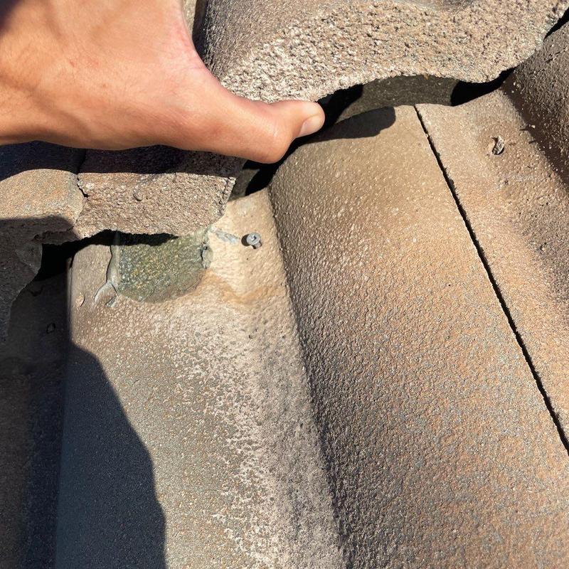 Concrete tile with visible cracks and damage