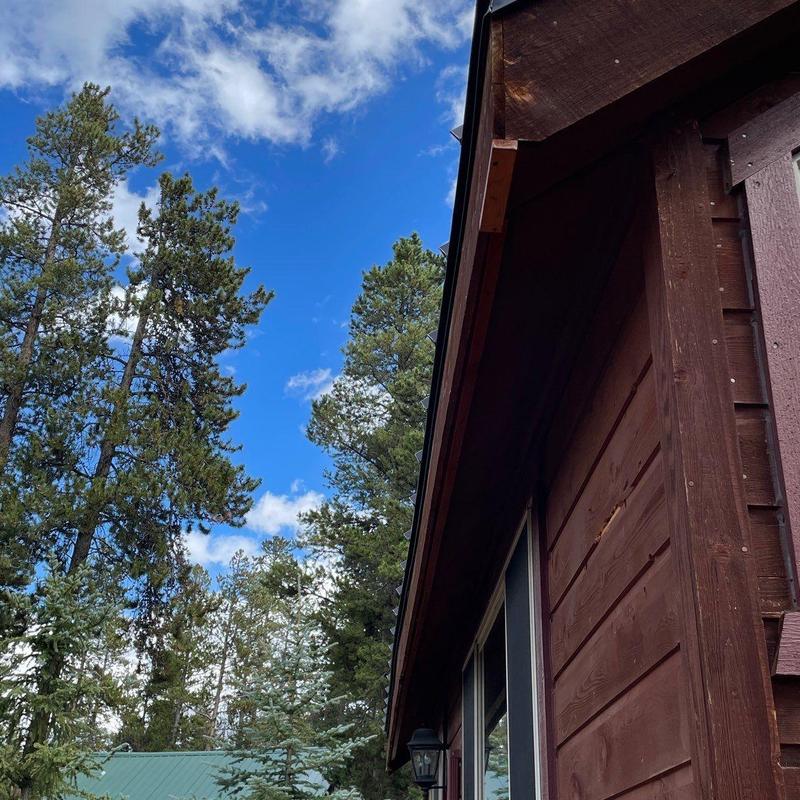 Class 4 roofing shingles on mountain cabin roof edge