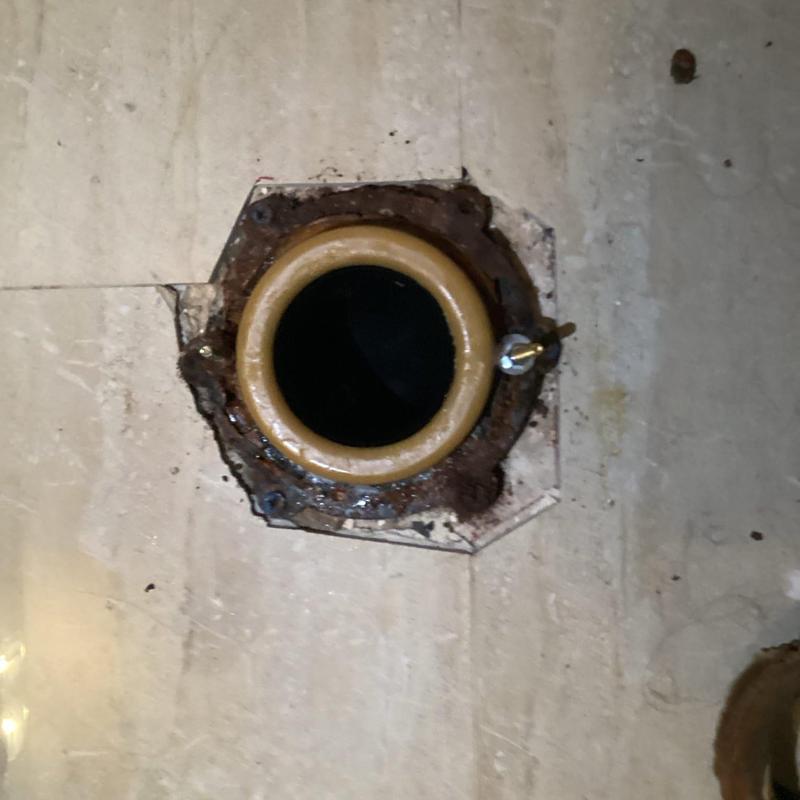 Toilet flange with wax ring seal on floor