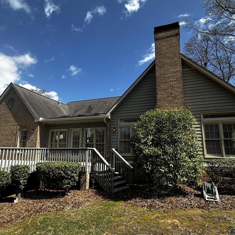 Roof shingles and chimney inspection after wind storm