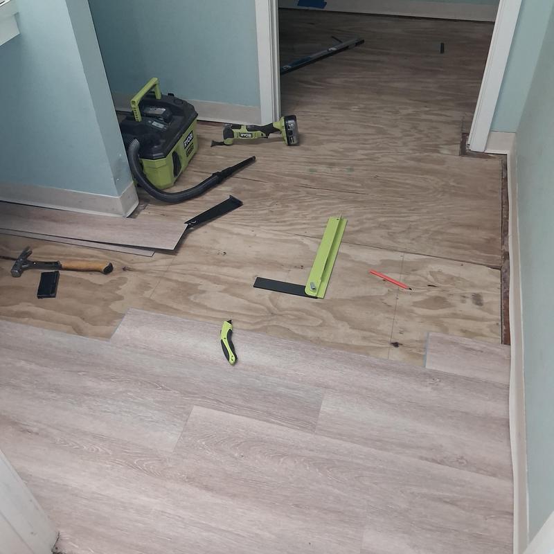 Laminate vinyl plank flooring installation with tools