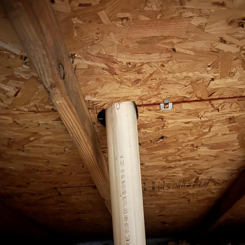 Roof pipe penetration with damaged sheathing cutout