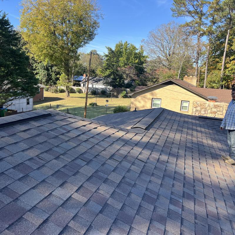 Roof decking with architectural shingles and reframed slope