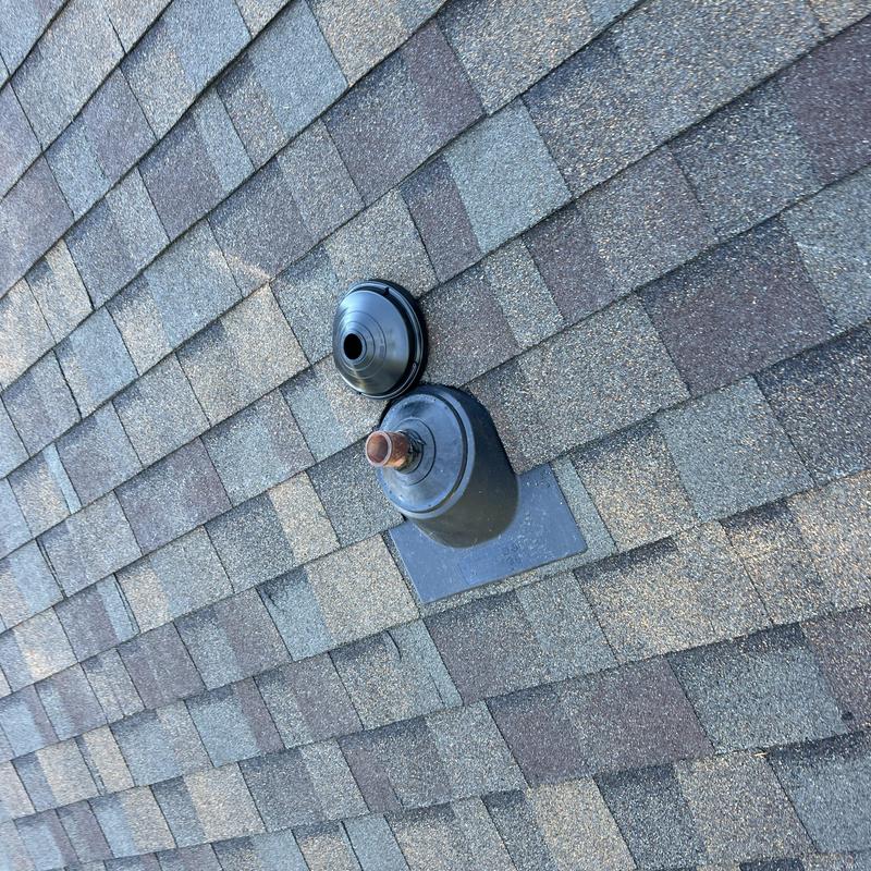 Roof pipe flashing with detached vent boot on shingles