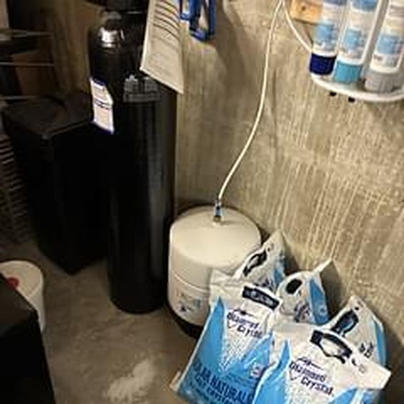 Water softener system with bags of softener salt