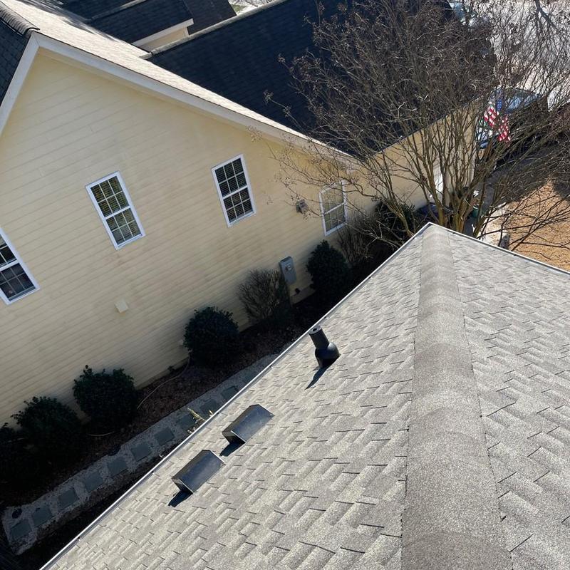 Asphalt shingle roof replacement after hail damage