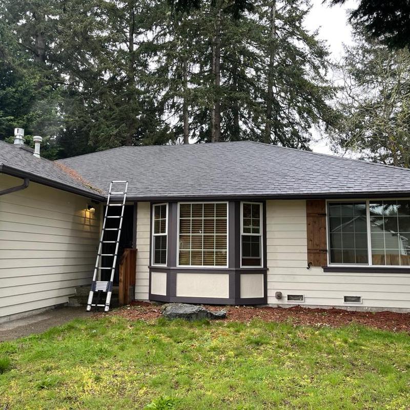 Asphalt shingle roof and exterior siding of house