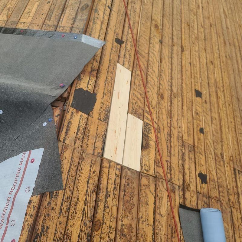 Asphalt roof decking with wood replacement and underlayment
