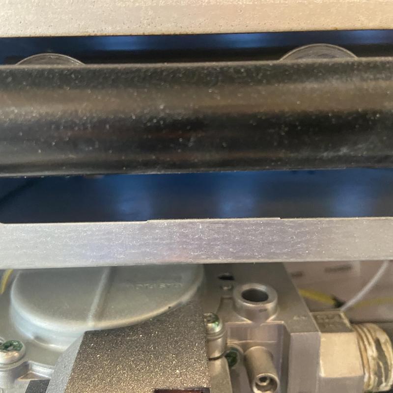 Gas valve assembly on HVAC unit close-up inspection