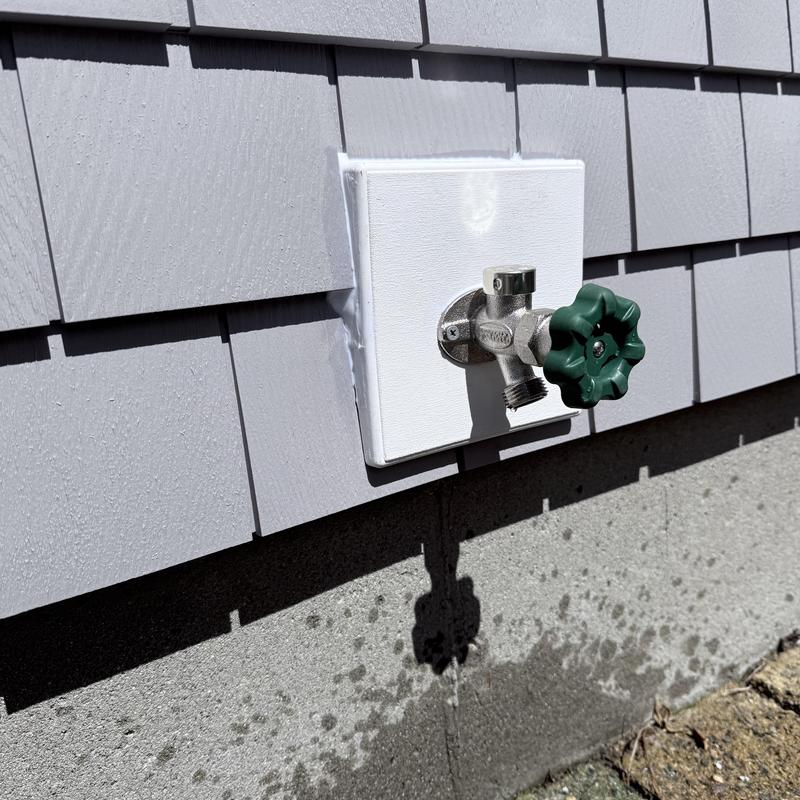 Globe valve and hose connection on exterior wall