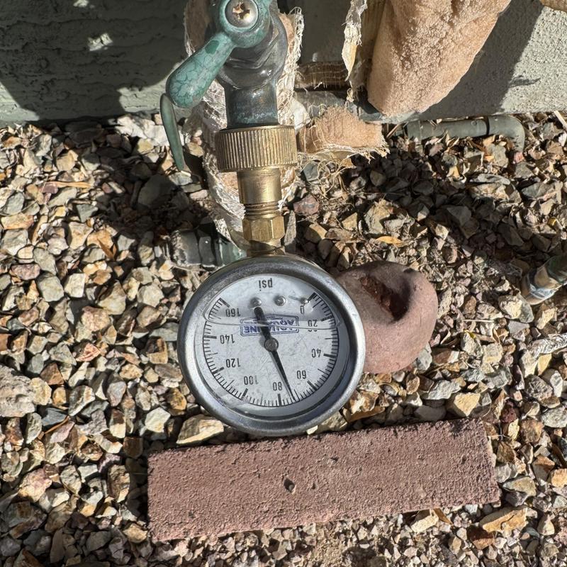 Pressure gauge on outdoor water valve with corrosion Pressure gauge on outdoor water valve with corrosion