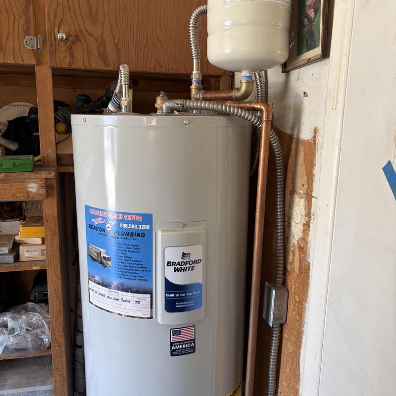 Electric water heater with expansion tank installation