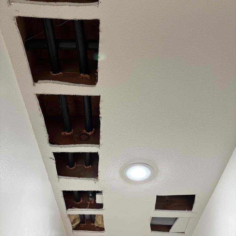 Waterline pipes with cut ceiling access panels