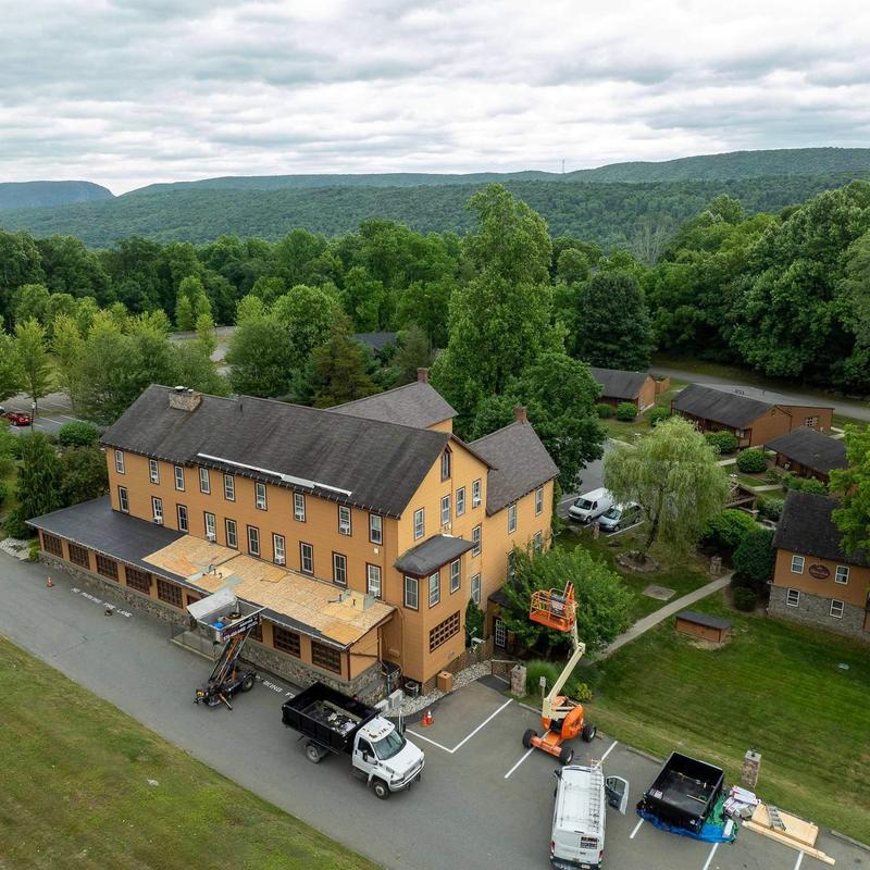 Commercial building roof under installation with equipment Commercial building roof under installation with equipment