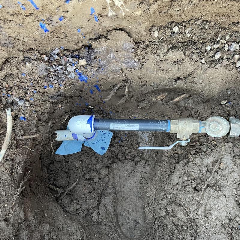 PVC water pipe with brass ball valve shut off installed