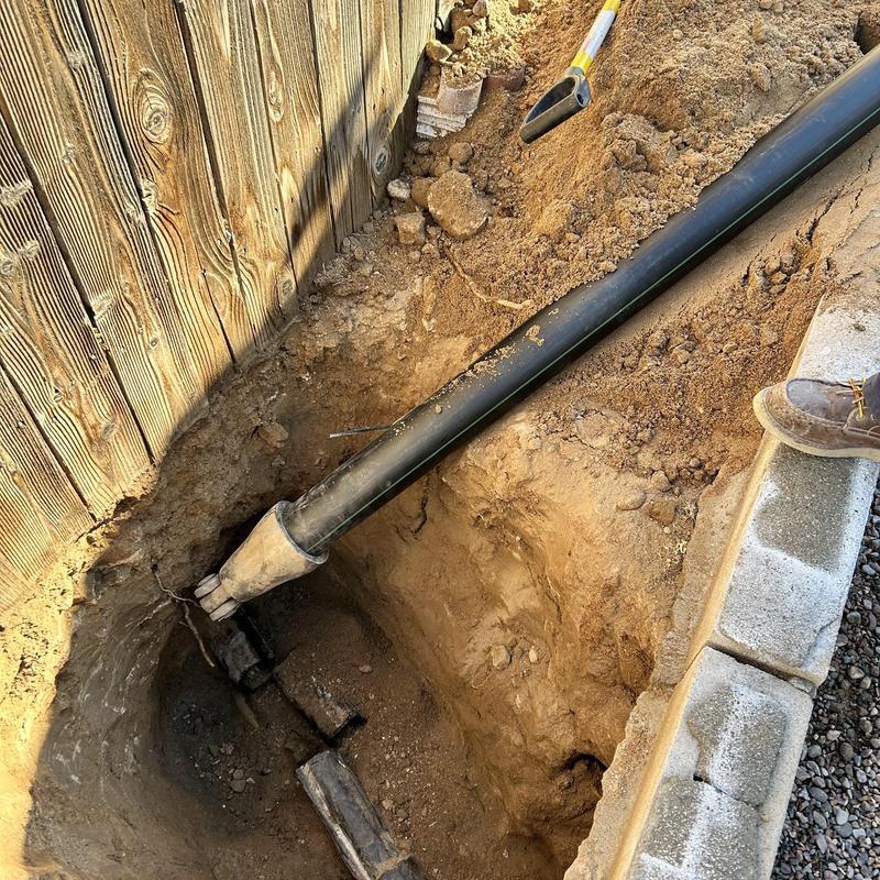 Drain pipe replacement with trenchless sewer machine in trench
