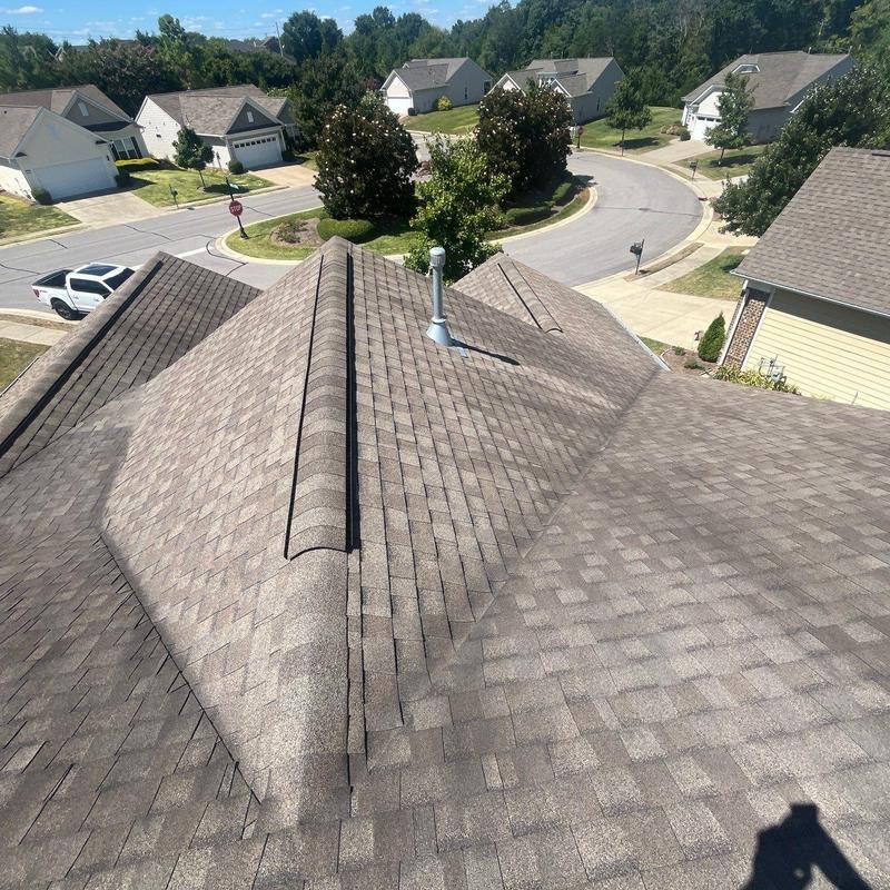 Asphalt shingle roof with ridge and vent inspection