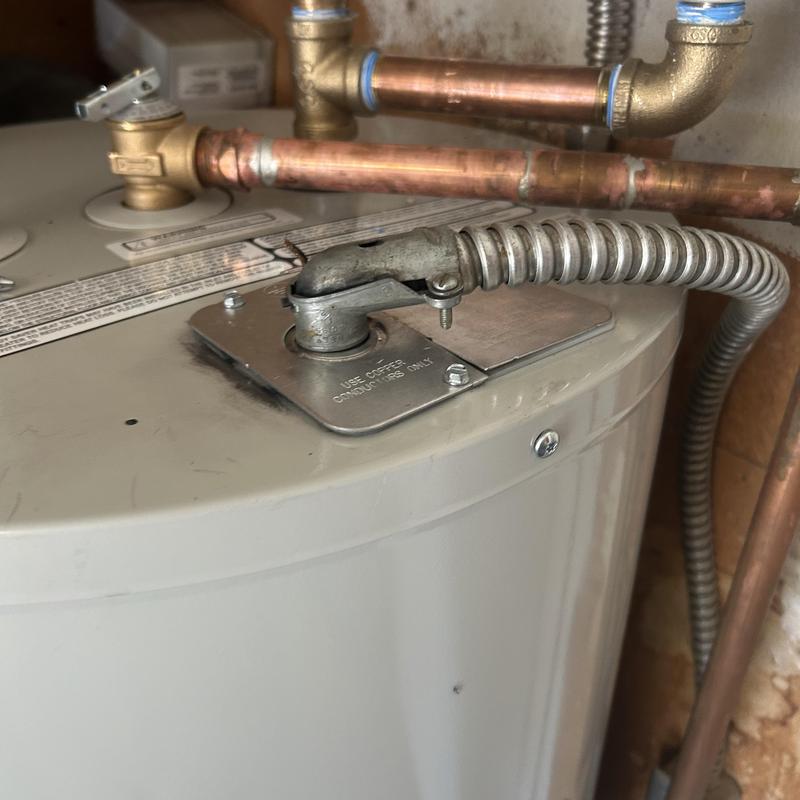 Water heater wiring and copper pipe connections in Boise