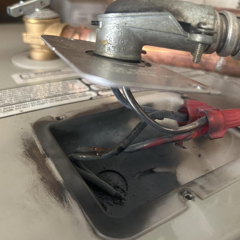 Water heater wiring with burnt wire connection
