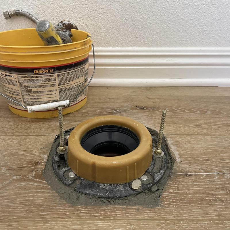 Toilet closet flange installation with concrete patch