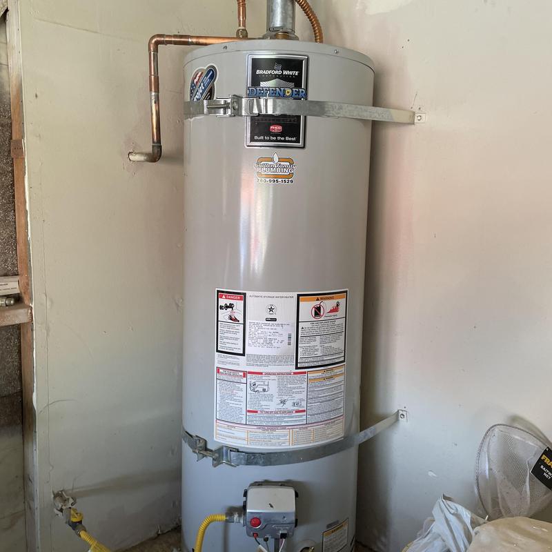 Water heater with new anode rod and waterlines