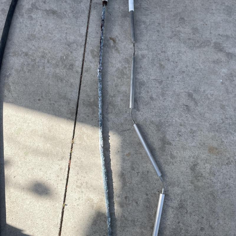 Water heater anode rods old versus new comparison on concrete