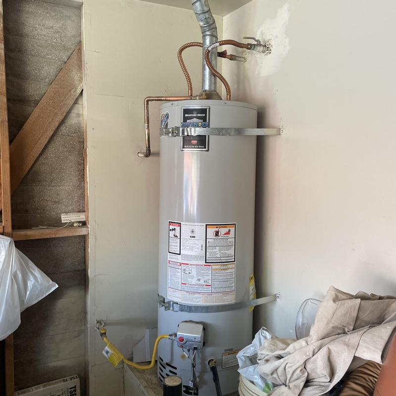 Water heater with new anode rod and waterlines installed