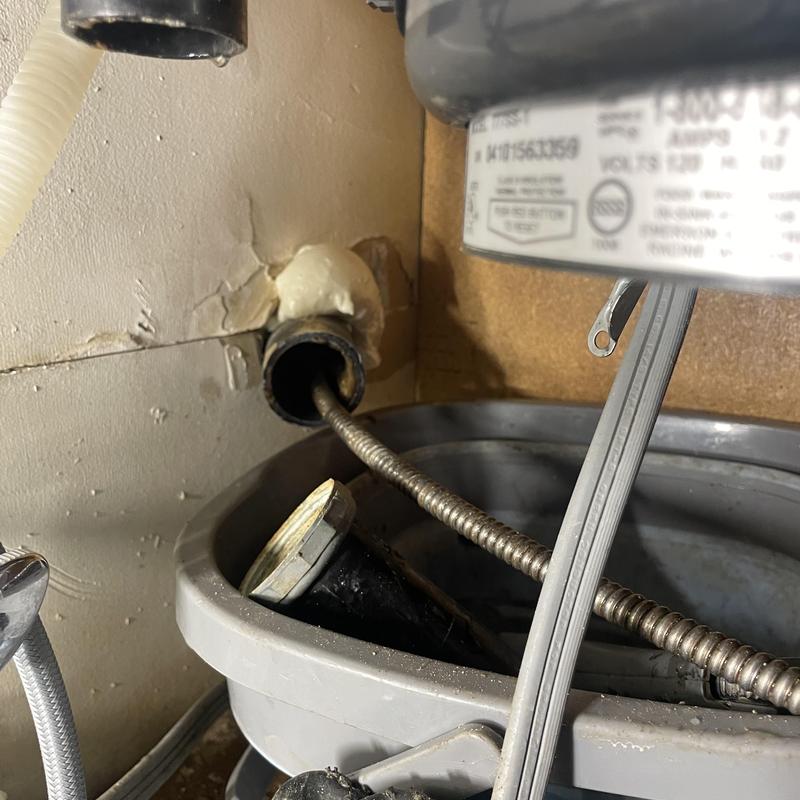 Kitchen sink drain line with sewer cable cleaning
